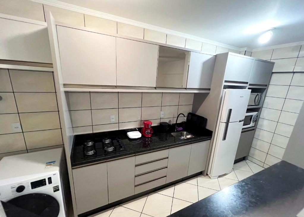 Imagen de la galería de Apartamento Pé na Areia em Itapema, en Itapema