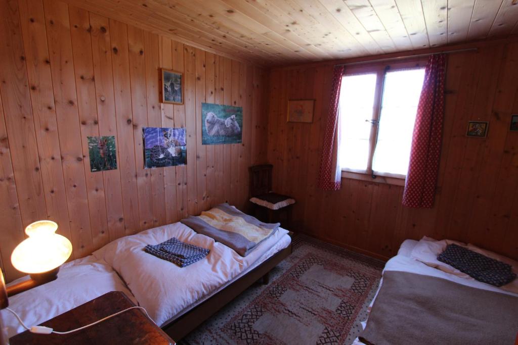 Postel nebo postele na pokoji v ubytování Plans
