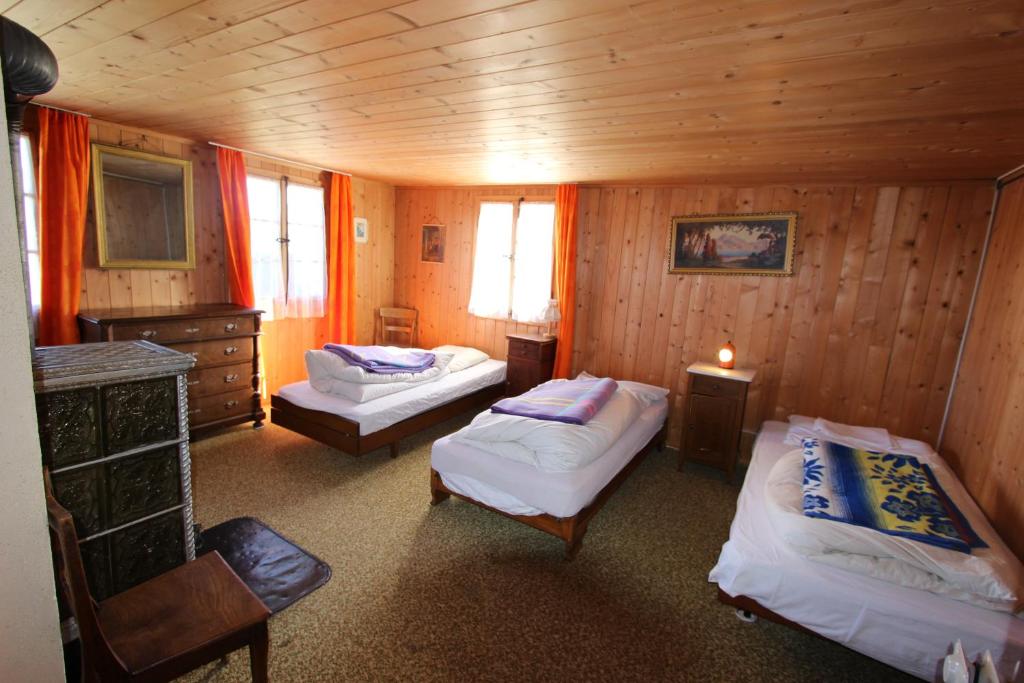Postel nebo postele na pokoji v ubytování Plans