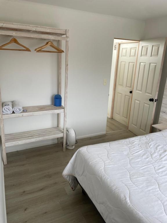 Postel nebo postele na pokoji v ubytování Hostal CKAIR
