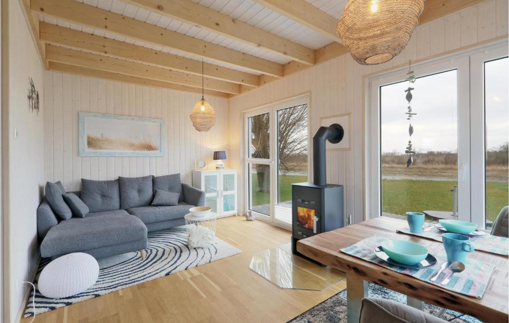 a living room with a couch and a table at Lieblingsplatz in Olpenitz