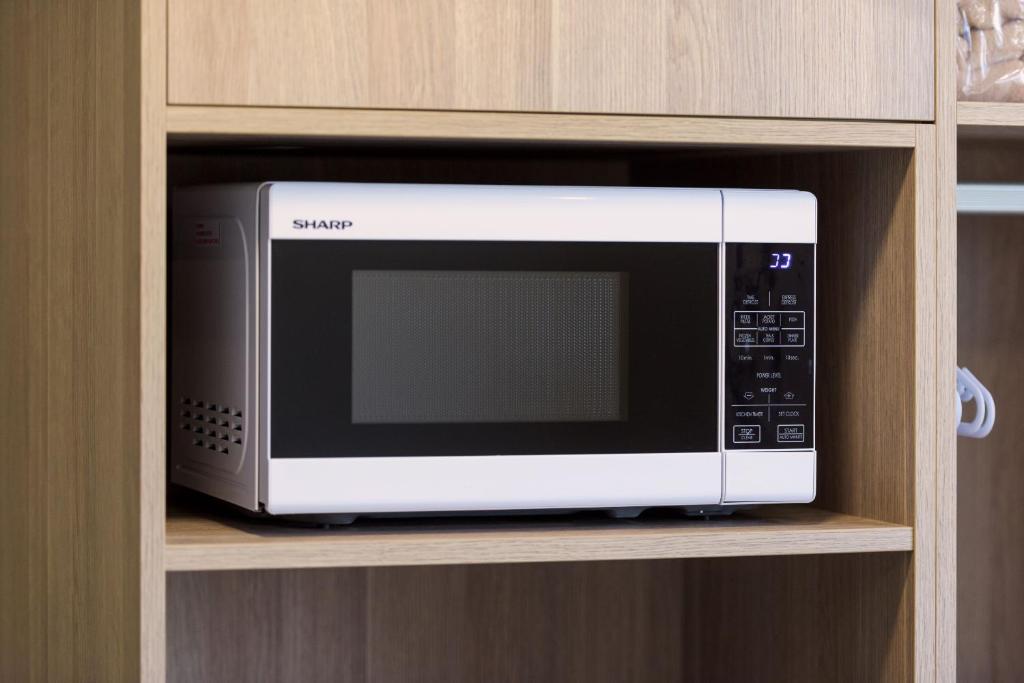 Kuchyň nebo kuchyňský kout v ubytování Somerset Hotel