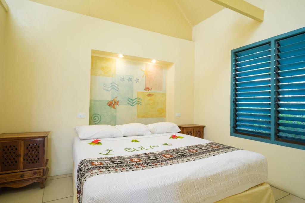 Postel nebo postele na pokoji v ubytování Fiji Hideaway Resort & Spa