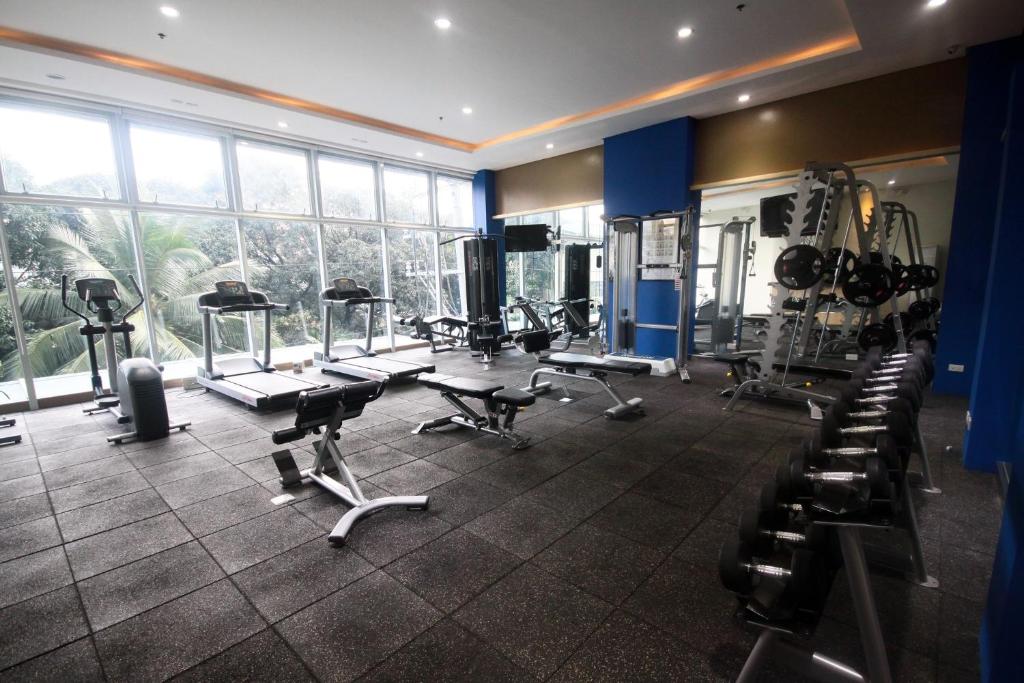 Fitness centrum a/nebo fitness zařízení v ubytování UPad Hotel