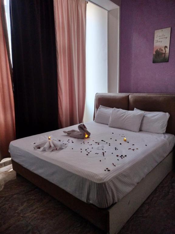 Postel nebo postele na pokoji v ubytování Abdeen Cairo Hostel