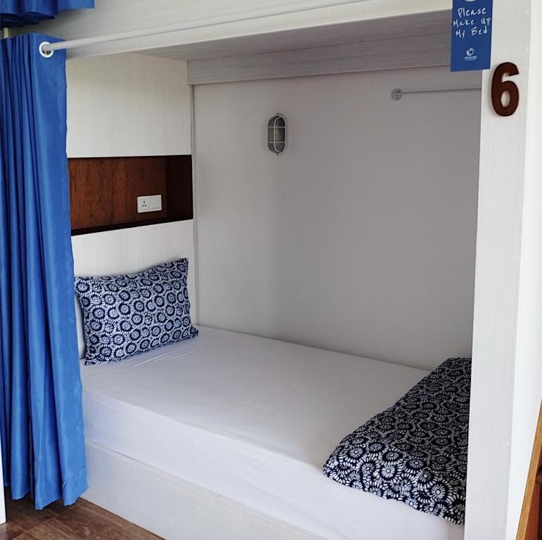 Postel nebo postele na pokoji v ubytování Dip & Doze Living
