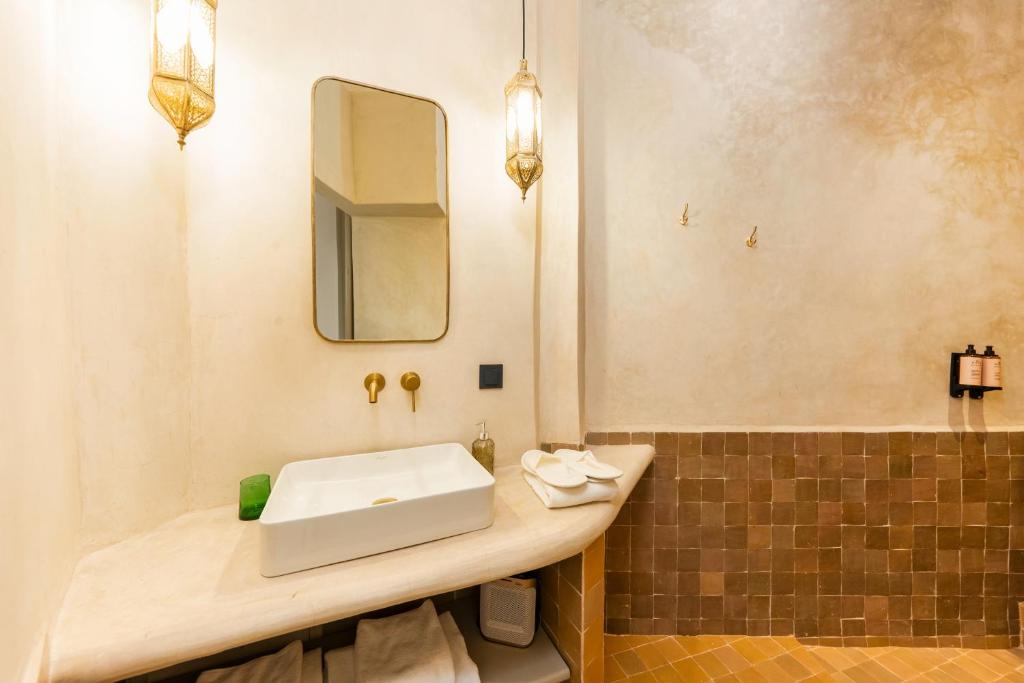 Koupelna v ubytování Suites & Spa BY XO-RIAD