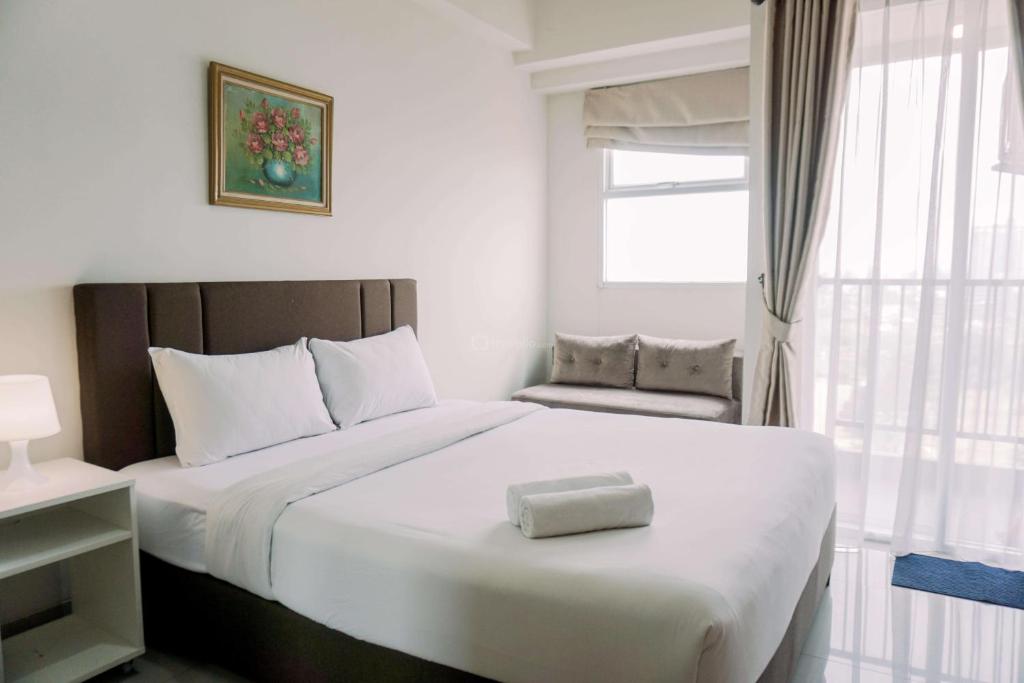 Postel nebo postele na pokoji v ubytování Restful and Enjoy Living Studio Parkland Avenue Apartment By Travelio