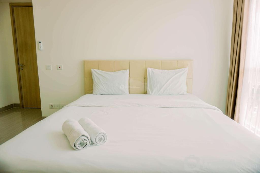 Postel nebo postele na pokoji v ubytování Spacious and Elegant 2BR with Private Lift at Hillcrest House Apartment By Travelio