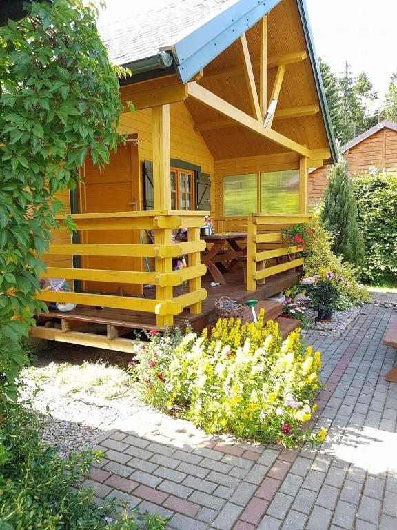 Ferienhaus in Gmina Postomino mit Terrasse, Garten und Grill, Rusinowo