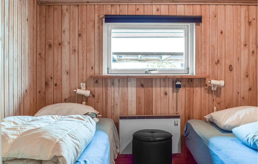 Postel nebo postele na pokoji v ubytování Holiday Home Tofteager