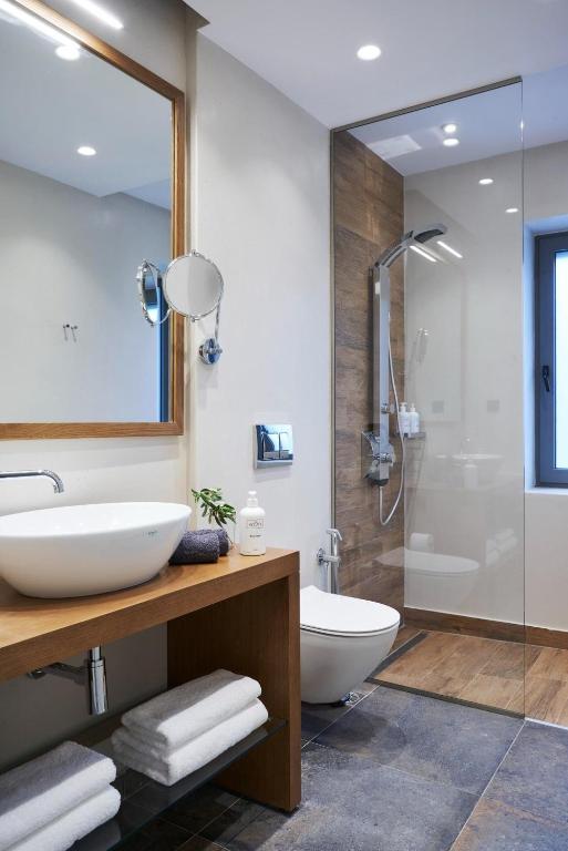 A bathroom at Beachfront Alassa Villas with Private Pools