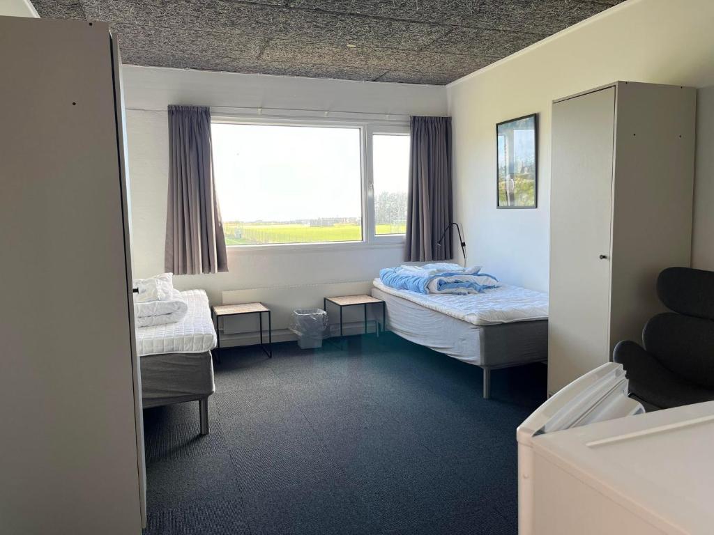 Voodi või voodid majutusasutuse Hirtshals Idrætscenter - Vandrehjem - Hostel toas
