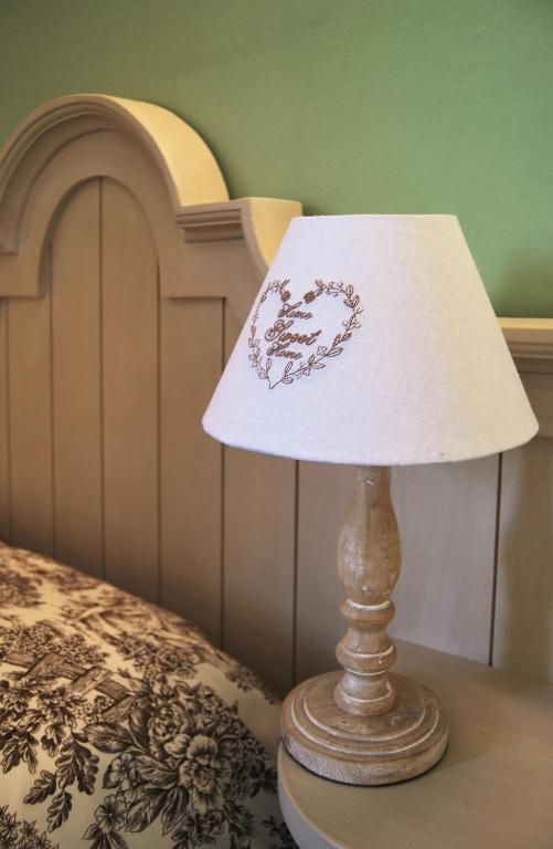 Postel nebo postele na pokoji v ubytování Agriturismo Ripaiani