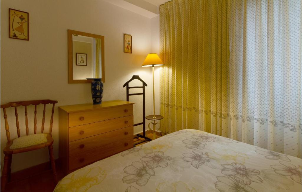 Postel nebo postele na pokoji v ubytování 2 Bedroom Cozy Apartment In Gandia