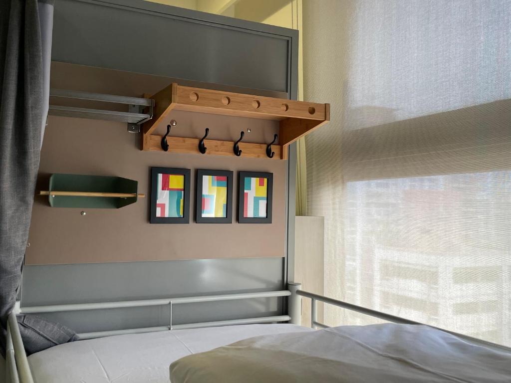 Postel nebo postele na pokoji v ubytování Easymind Guesthouse Taipei Main Station
