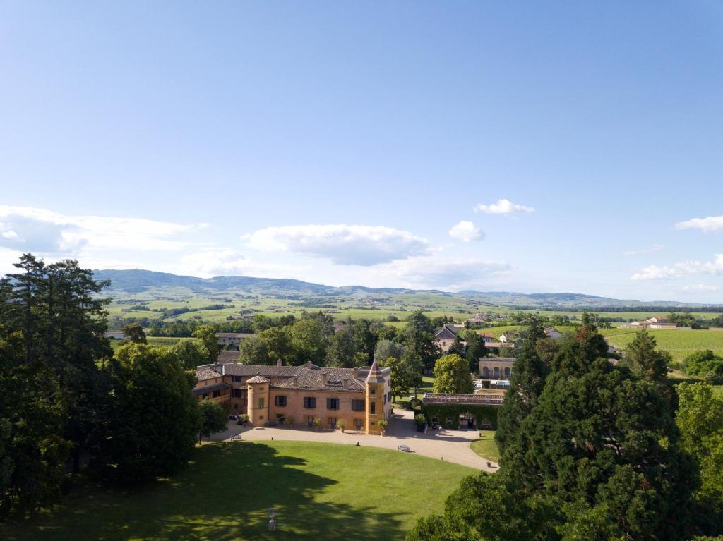 an aerial view of a large house with a park at Ch&acirc;teau de Briante in Saint-Lager