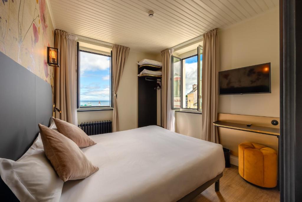 Postel nebo postele na pokoji v ubytování Grand Hôtel de Bretagne