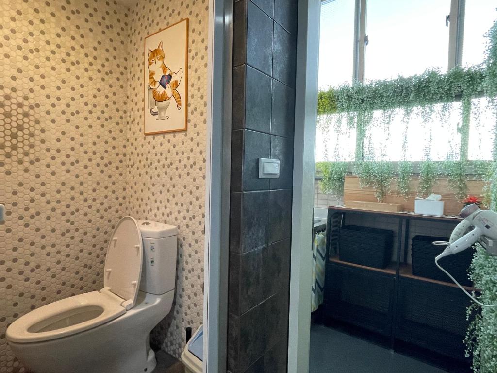 Koupelna v ubytování Easymind Guesthouse Taipei Main Station