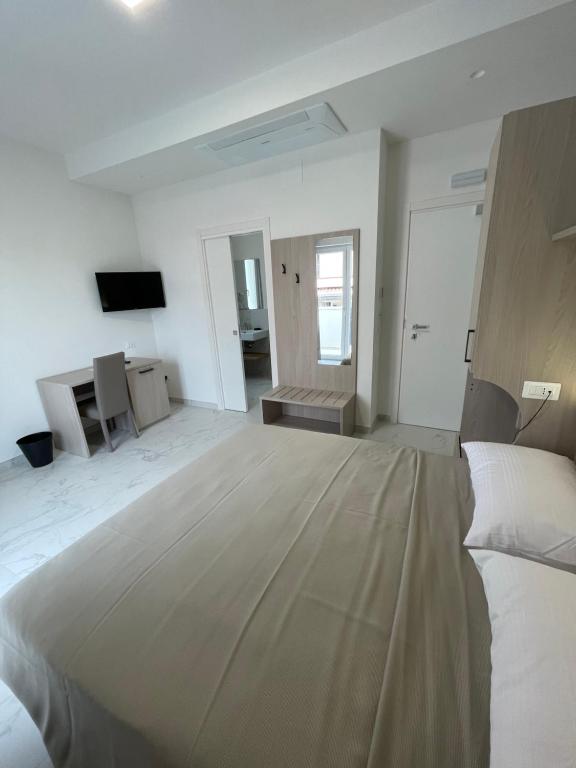 Postel nebo postele na pokoji v ubytování Hotel Diadema