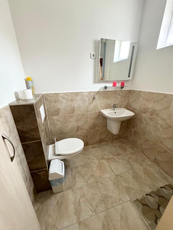 Koupelna v ubytování Zam-Zem Holiday Apartman