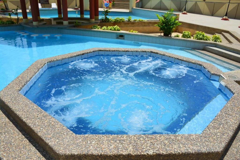 Bazén v ubytování Playa Almendro Resort nebo v jeho okolí