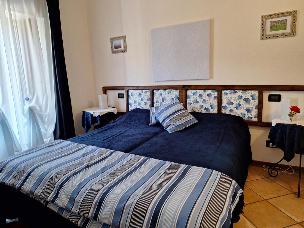 Postel nebo postele na pokoji v ubytování Agriturismo Cà Trinche
