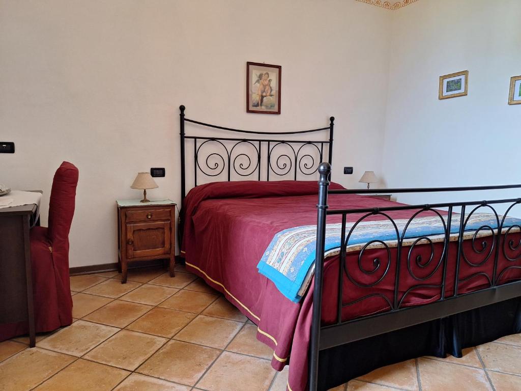 Postel nebo postele na pokoji v ubytování Agriturismo Cà Trinche