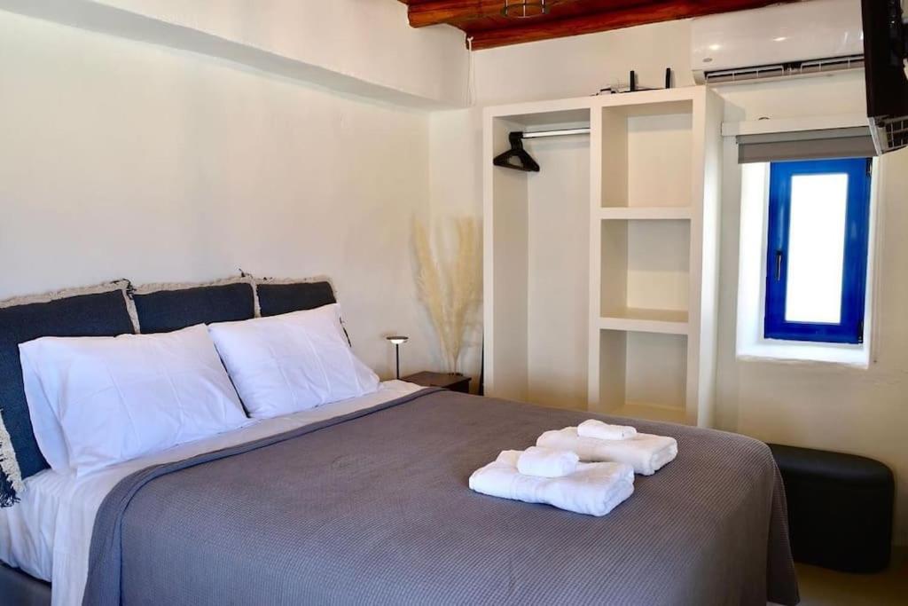 Postel nebo postele na pokoji v ubytování Argalios apartment