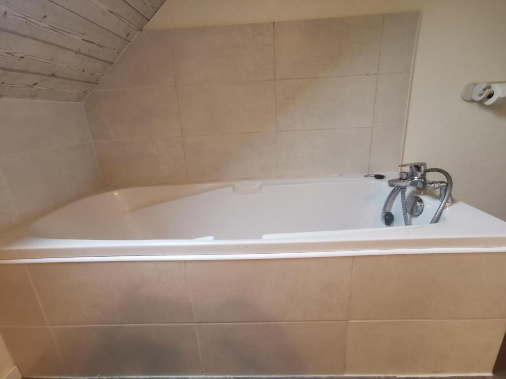 Kúpeľňa v ubytovaní La Maison Bleue, Suite