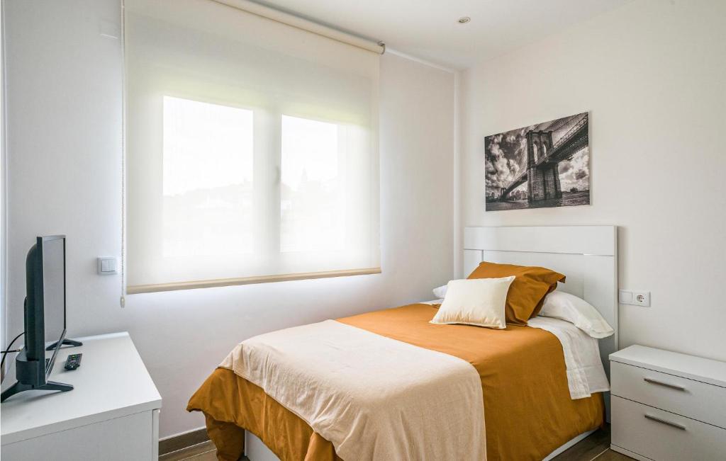 A bed or beds in a room at Awesome Home In Noia With Wifi