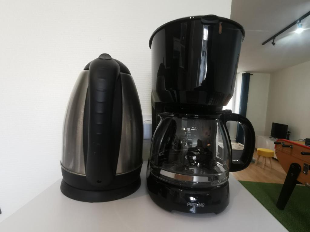 Príslušenstvo na prípravu kávy alebo čaju v ubytovaní La Maison Bleue, Suite