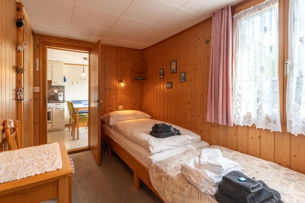 Postel nebo postele na pokoji v ubytování Chalet Chrumm