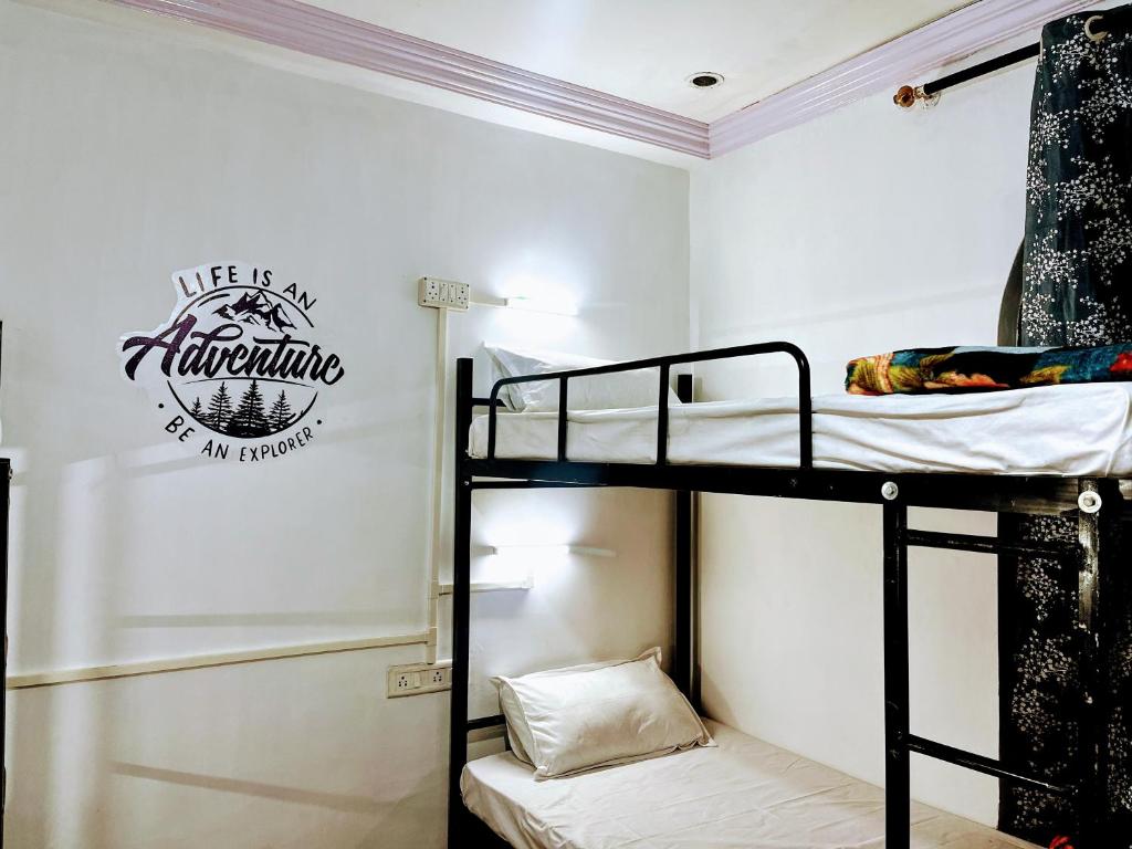 Voodi või voodid majutusasutuse The Bunkyard Hostel toas