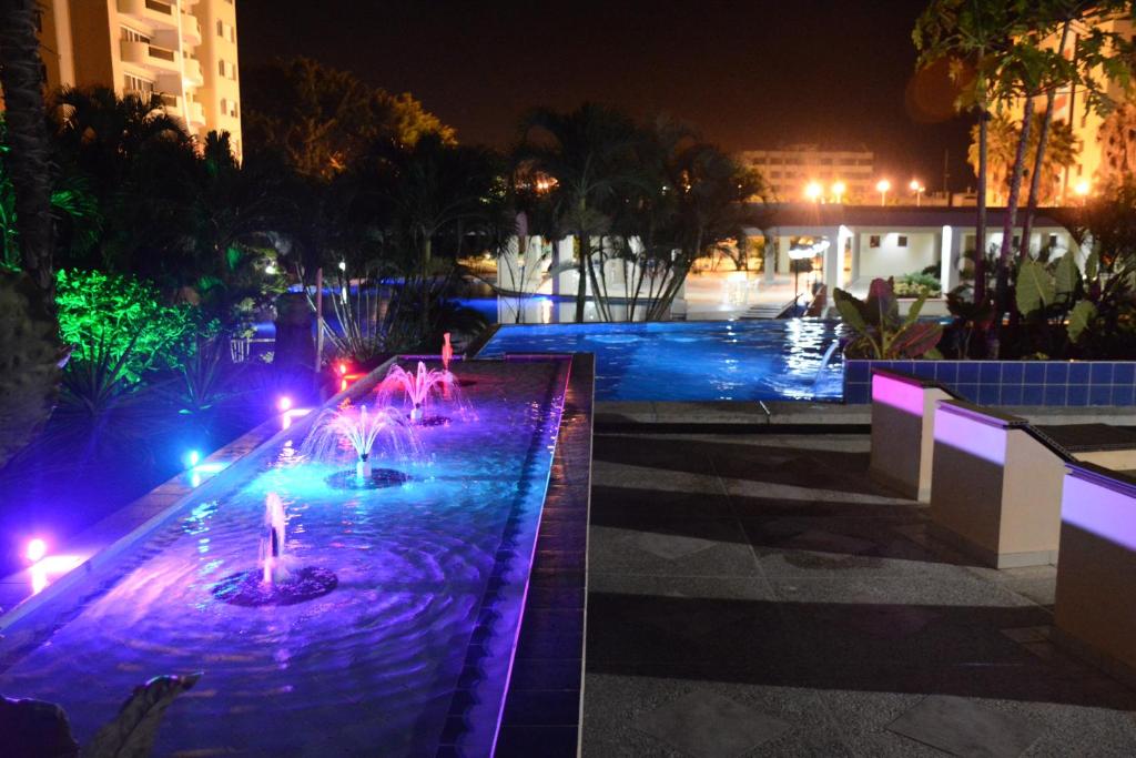 Bazén v ubytování Playa Almendro Resort nebo v jeho okolí