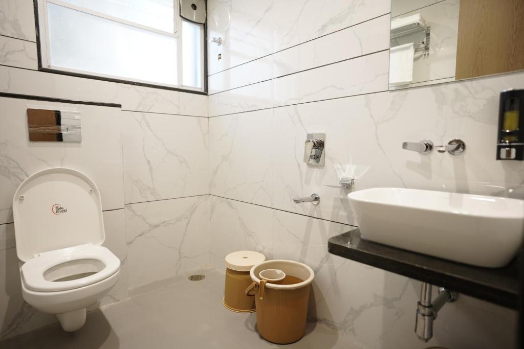 Koupelna v ubytování A Square Executive Hotel