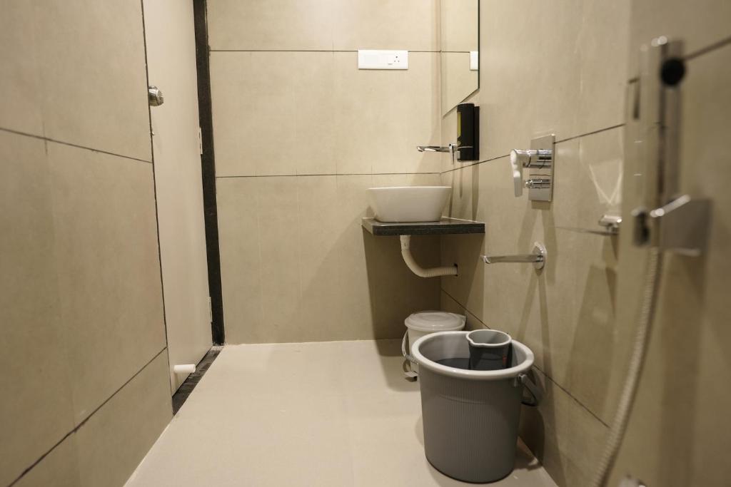 Koupelna v ubytování A Square Executive Hotel