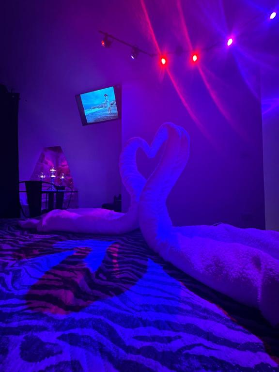 Postel nebo postele na pokoji v ubytování Rubino Suite & Spa