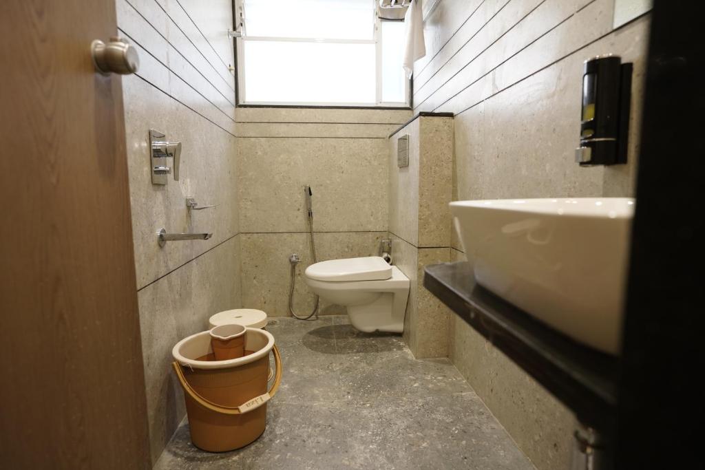 Koupelna v ubytování A Square Executive Hotel