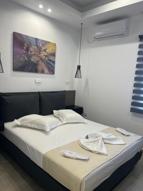 Postel nebo postele na pokoji v ubytování Stampalia Luxury Studios