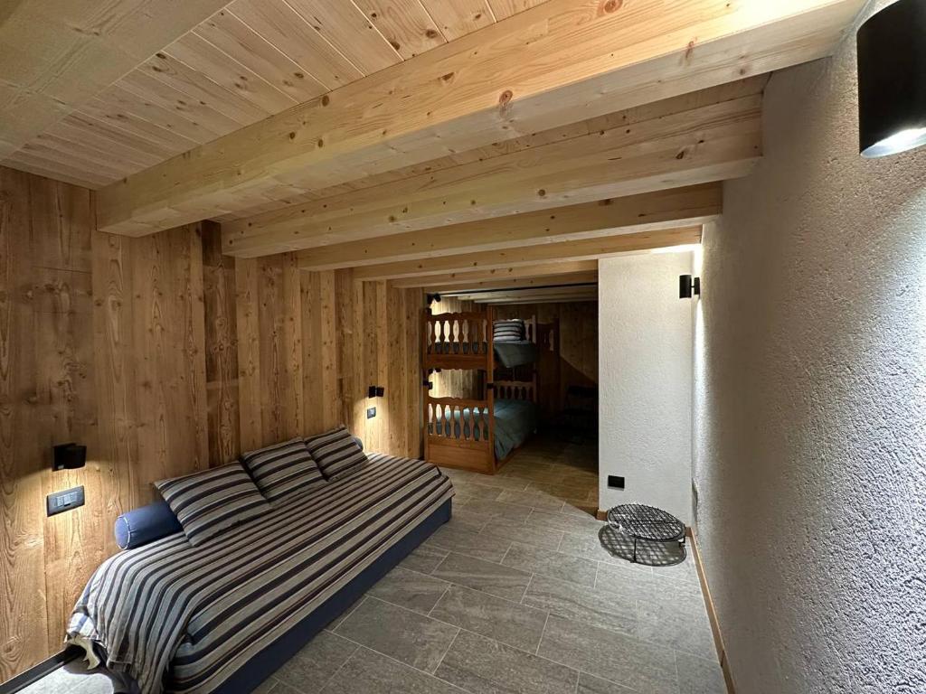 Postel nebo postele na pokoji v ubytování Chalet Val Ferret CIR 0246