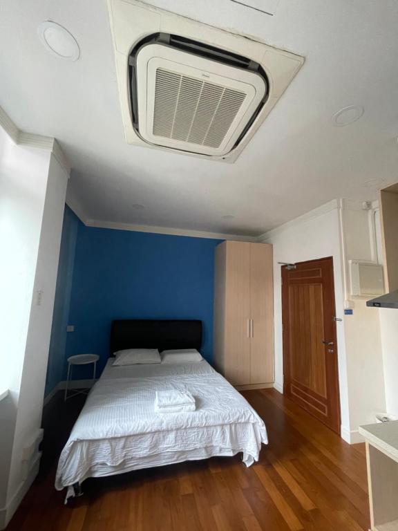 En eller flere senge i et værelse på 36 club st residence