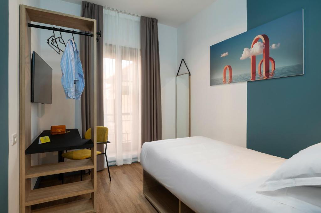 Postel nebo postele na pokoji v ubytování Rome Ciampino Smart Hotel