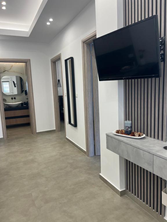 TV a/nebo společenská místnost v ubytování Stampalia Luxury Studios