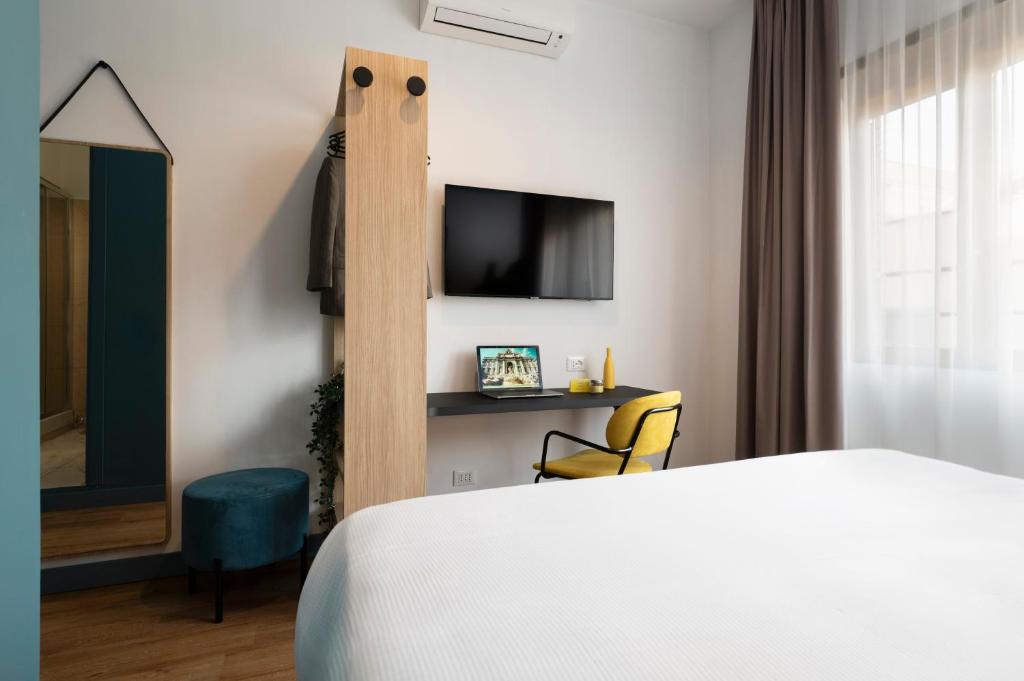 Postel nebo postele na pokoji v ubytování Rome Ciampino Smart Hotel