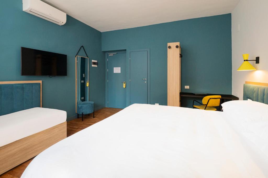 Postel nebo postele na pokoji v ubytování Rome Ciampino Smart Hotel