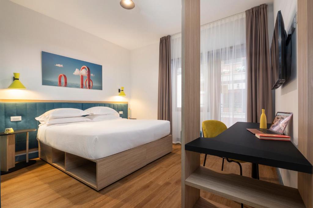 Postel nebo postele na pokoji v ubytování Rome Ciampino Smart Hotel