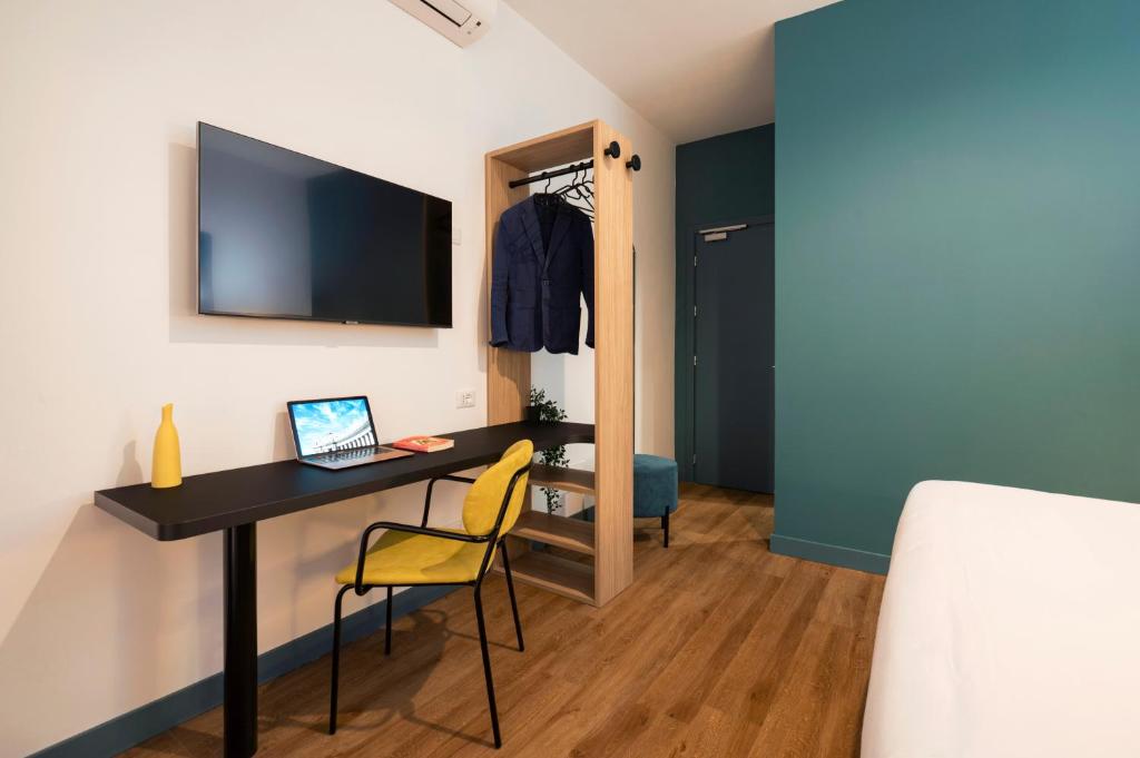 TV a/nebo společenská místnost v ubytování Rome Ciampino Smart Hotel