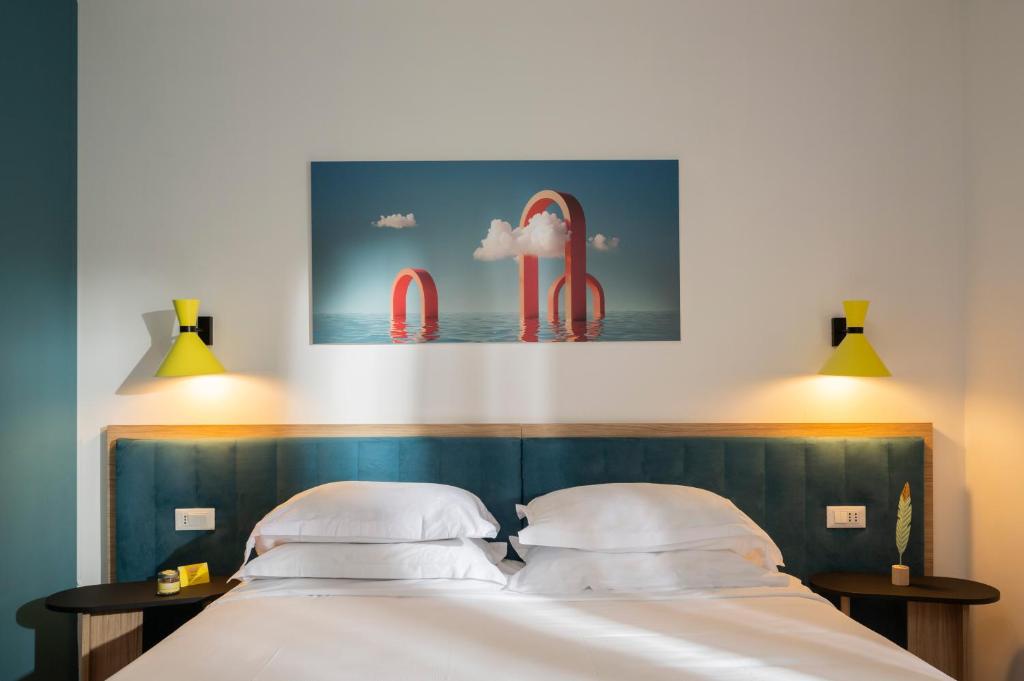 Postel nebo postele na pokoji v ubytování Rome Ciampino Smart Hotel
