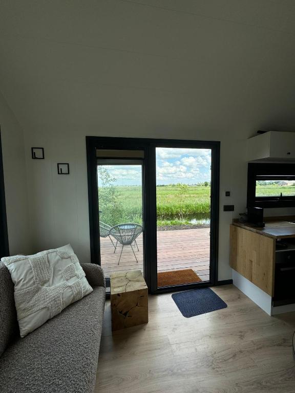 Posezení v ubytování TinyHouse Ochtendgloren